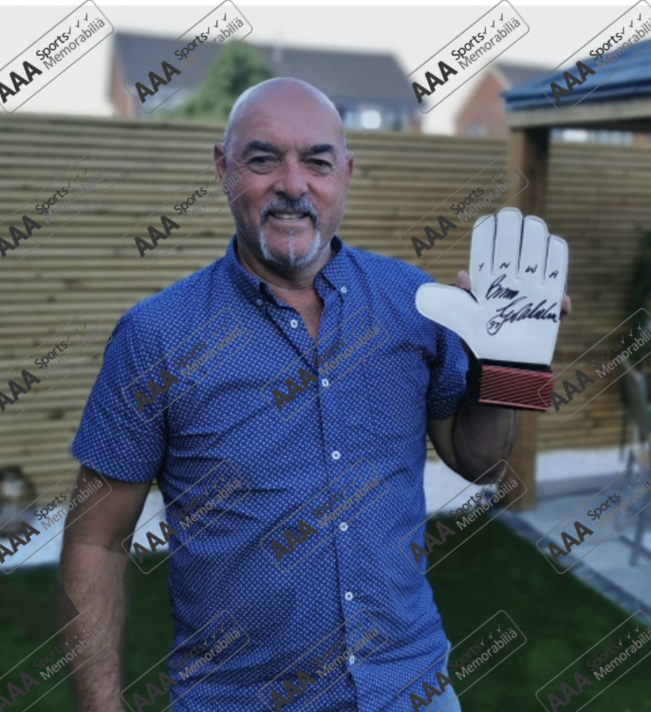 Bruce Grobbelaar Hand Signed RED Umbro Goalkeepers Glove In Deluxe Classic Frame.