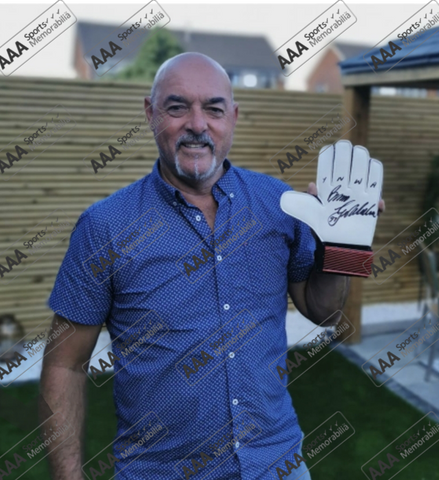 Bruce Grobbelaar Hand Signed RED Umbro Goalkeepers Glove In Deluxe Classic Frame.